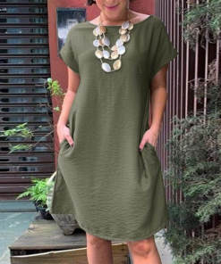 women with green cotton linen summer dress